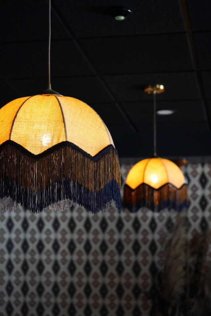 One-of-a-kind fringed fabric pendant designed for the Caldwell Bar at The Buxton Hotel